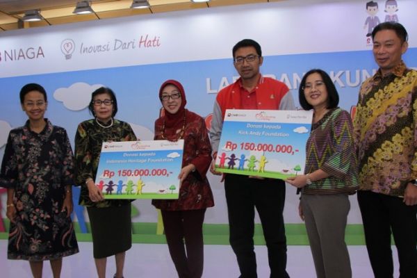 CIMB Niaga Serahkan Donasi AMDB 2014 Senilai Rp300 Juta ke Dua Yayasan
